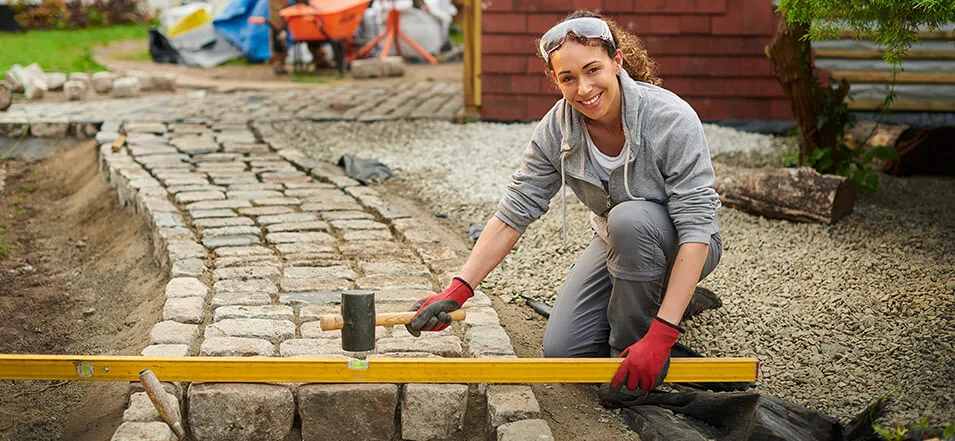 woman working on a yard project