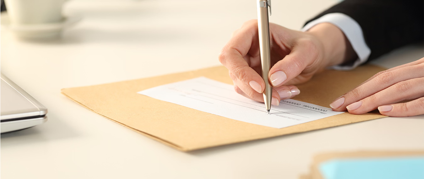 Customer writing a check from a United Community deposit account