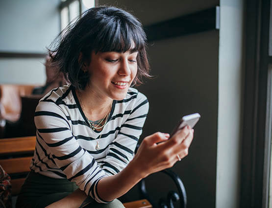 woman on the United Community mobile banking app