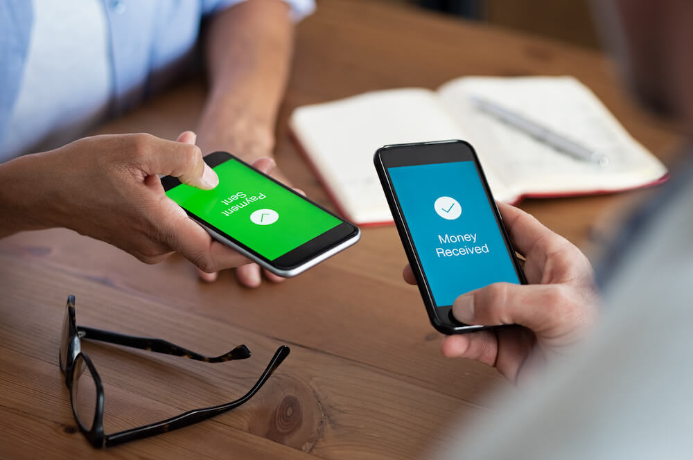 friends paying each other via mobile cash app