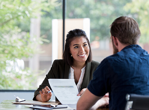 woman interviewing man for a job