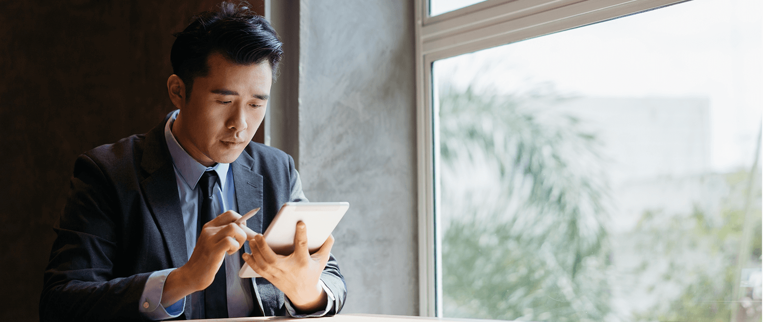 man using his tablet to contact United Community's customer service