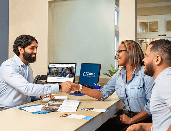 couple meeting with Mortgage Lender