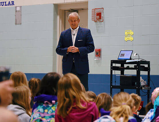 Rich Bradshaw teaching students about Financial Literacy