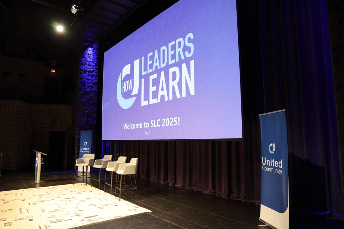 Banner and stage at leadership conference 