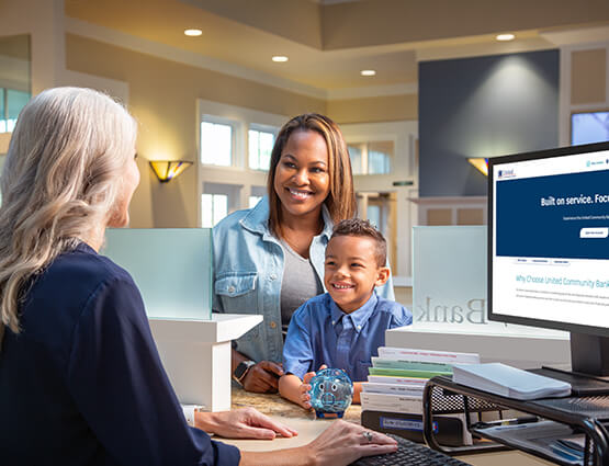 mom and son opening a Treasure Chest Savings account