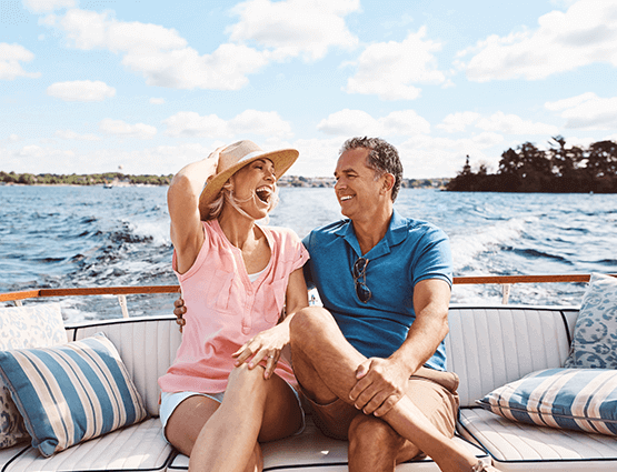 Man and woman sitting on boat