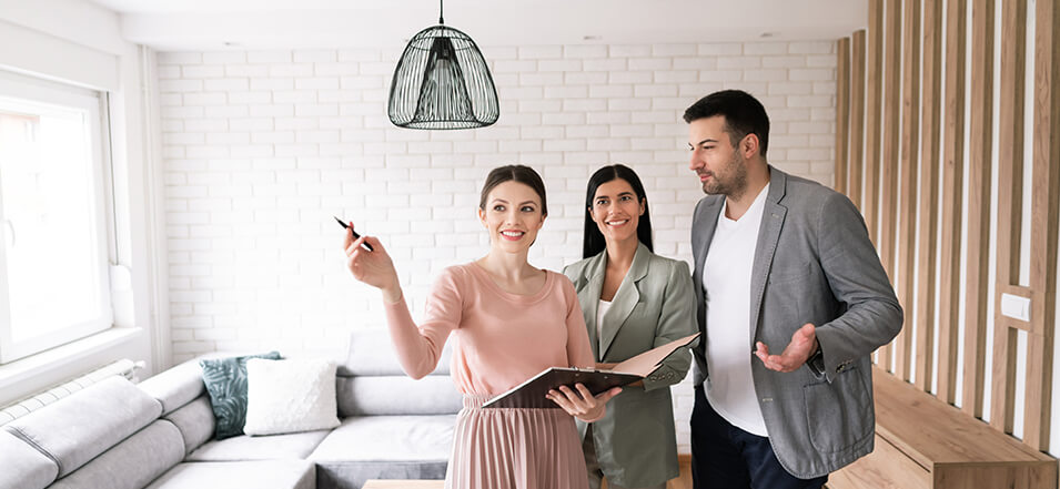Couple shopping for home with mortgage