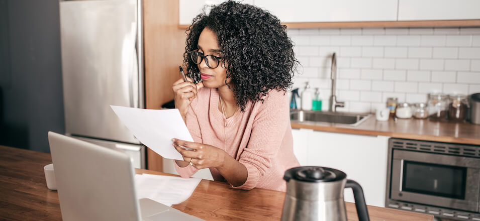 woman using calculator