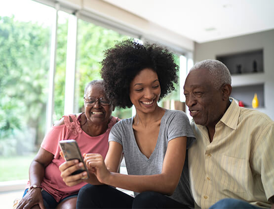 daughter showing parents how to use Zelle safely