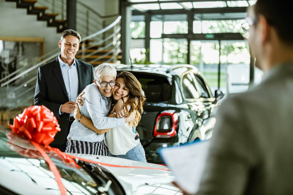 teen getting a new car for christmas with an auto loan