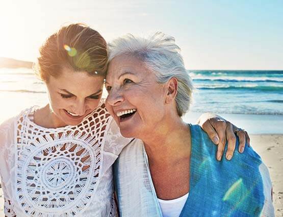 mother and daughter on beach