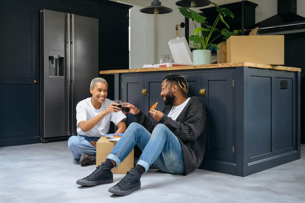 happy couple after buying a home