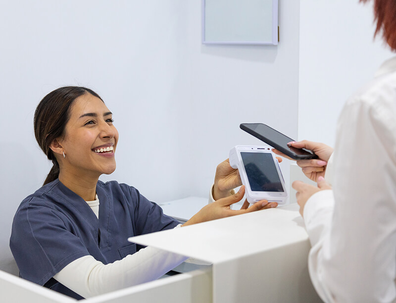 Healthcare Worker and Patient Paying