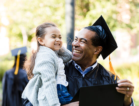 graduated father with his daughter