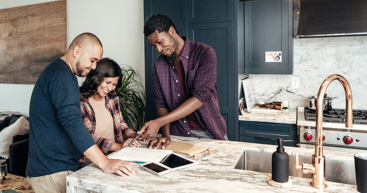 Family reviewing home plans