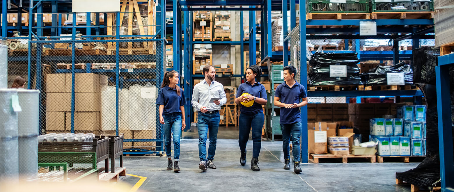 employees walking through factory