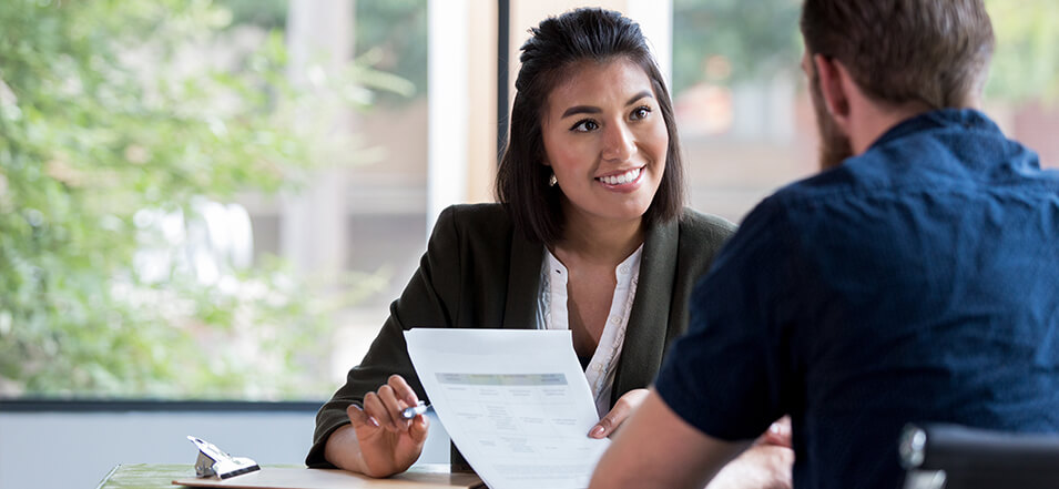 woman interviewing man for a job