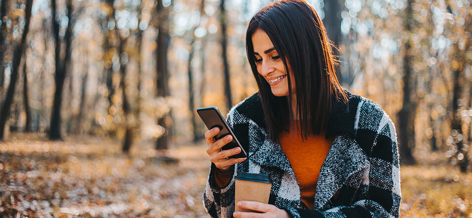 woman using United's digital services on mobile device